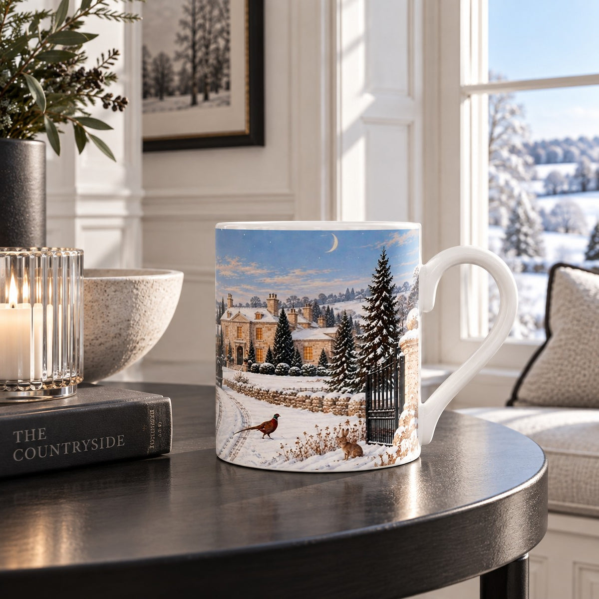 Winter wildlife mug showing deer beside a snow-covered willow tree and traditional country estate gates
