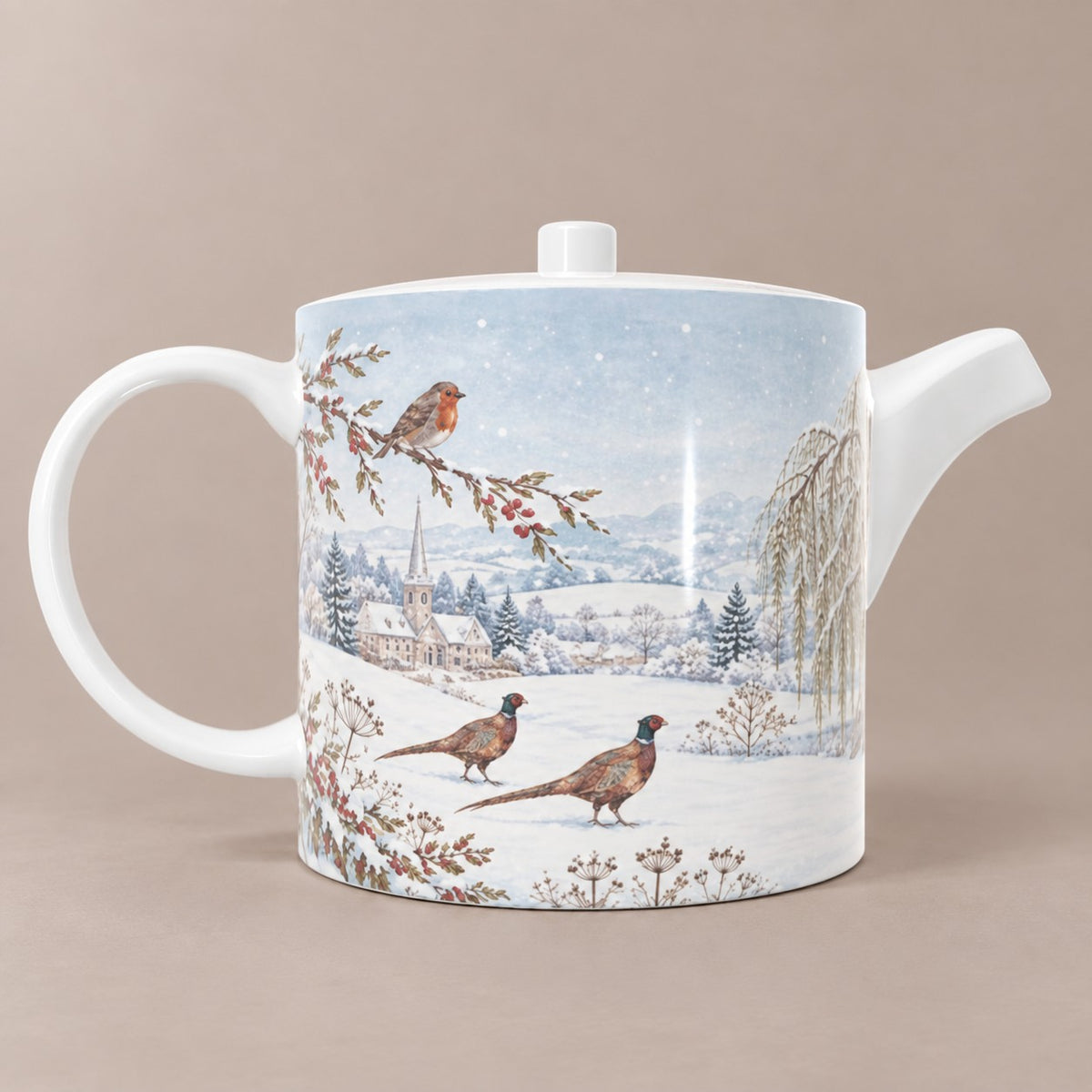 Bone china teapot with pheasants, robin and snowy British countryside beneath a pale winter sky