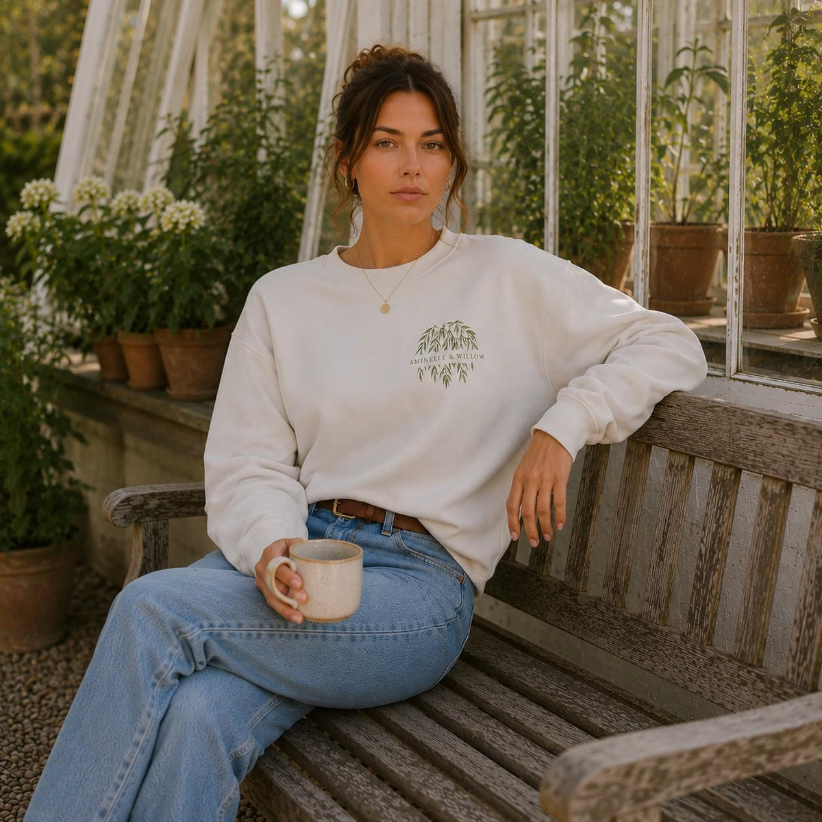 White Willow Crest sweatshirt with green Aminelle & Willow botanical chest design