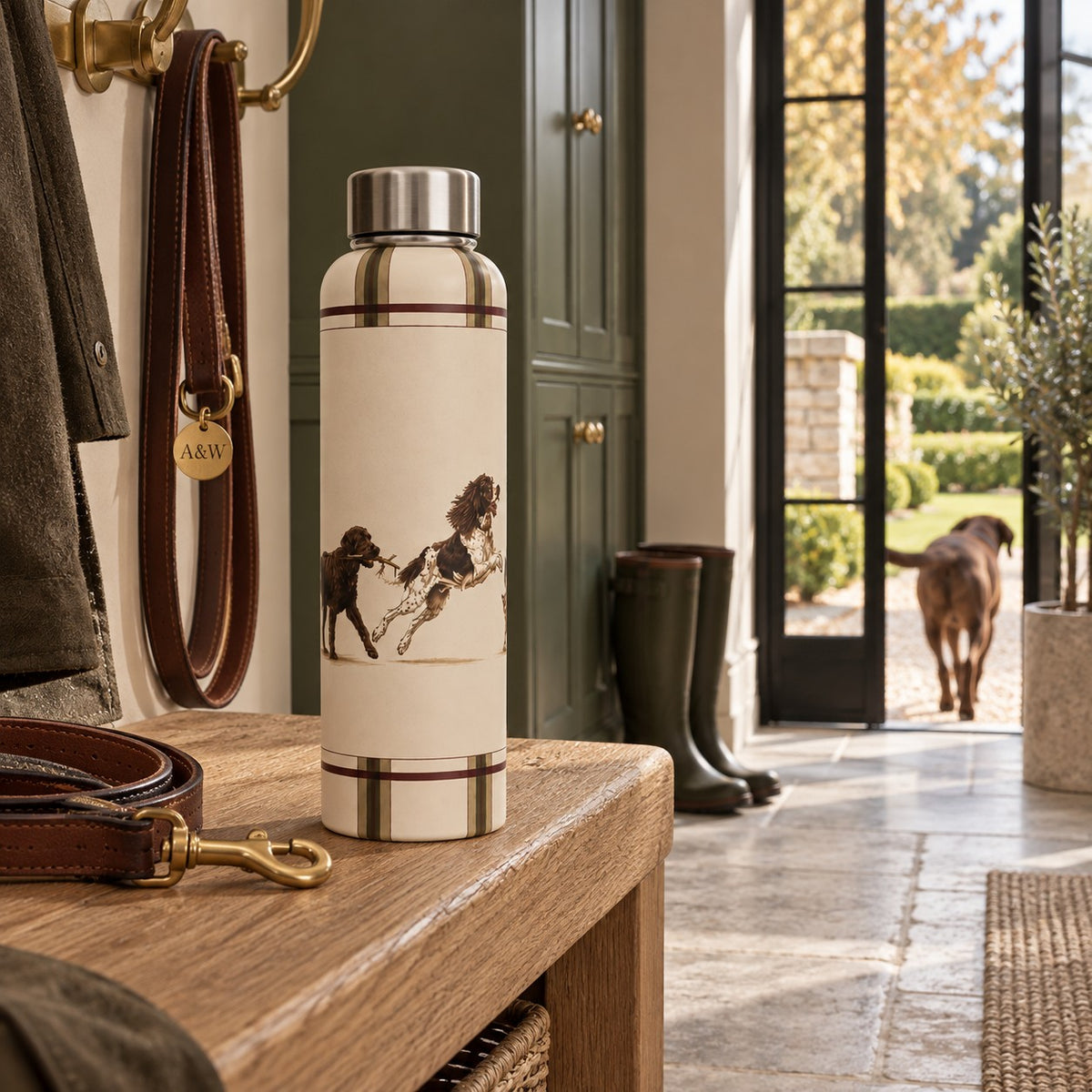 Country Dogs glass water bottle featuring illustrated dogs with a burgundy, taupe and brown checked border
