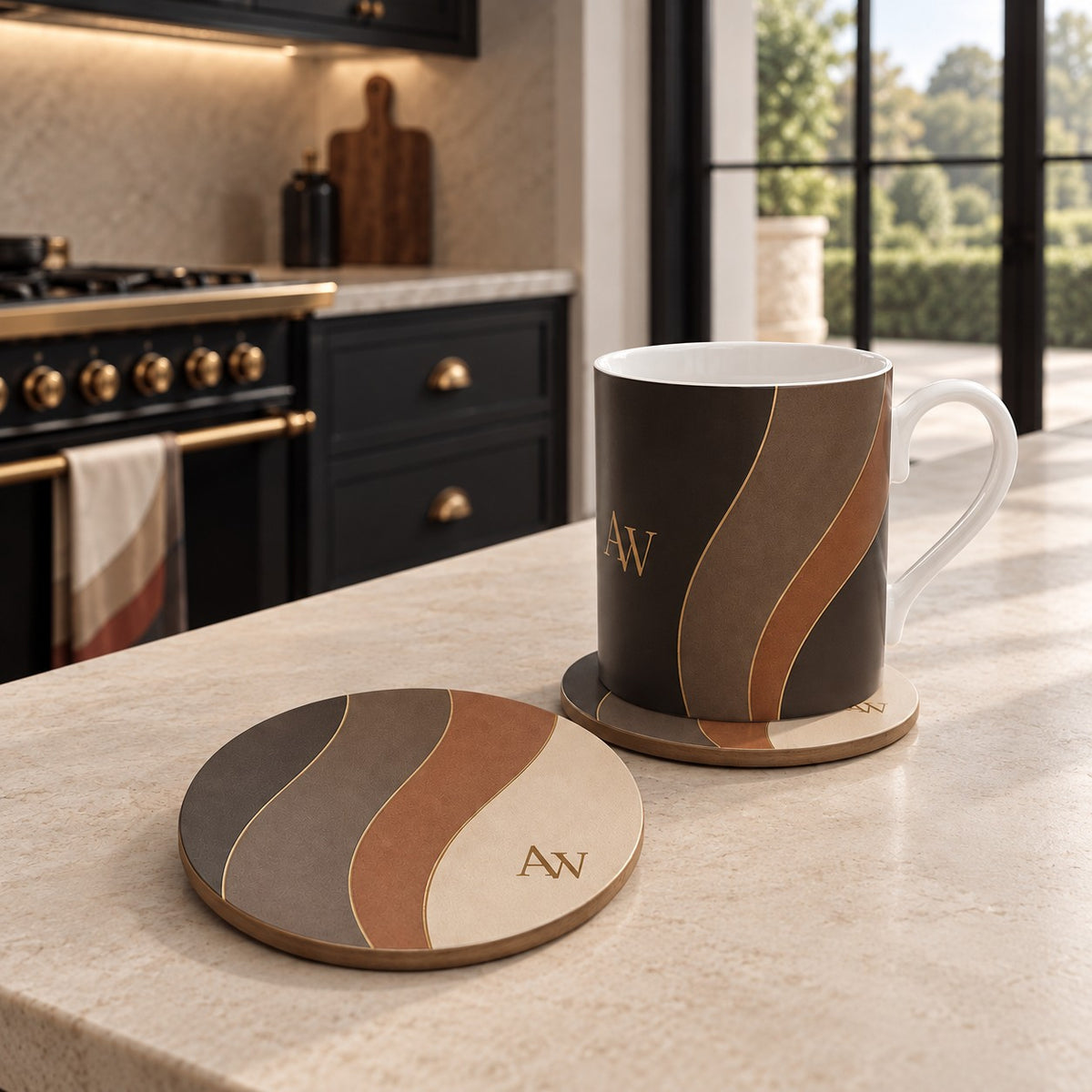 Estate Living Contour ceramic coasters with sweeping espresso, taupe, terracotta and soft stone curves, fine gold detailing and A&W monogram