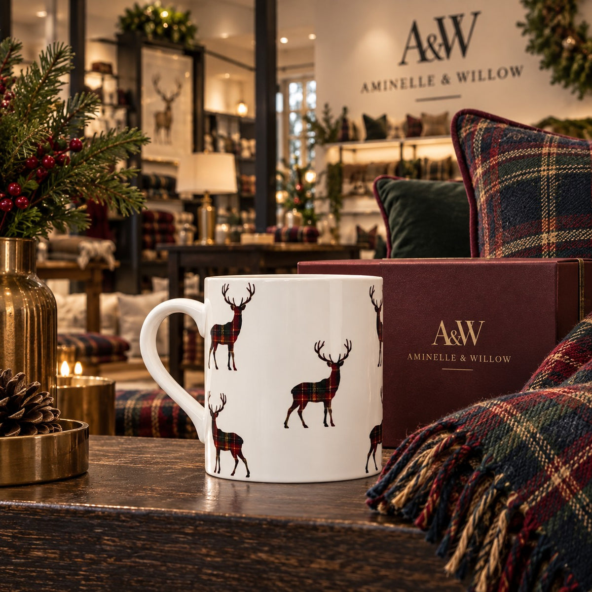 Fine bone china mug featuring tartan stags in forest green, burgundy and brown on a crisp white background