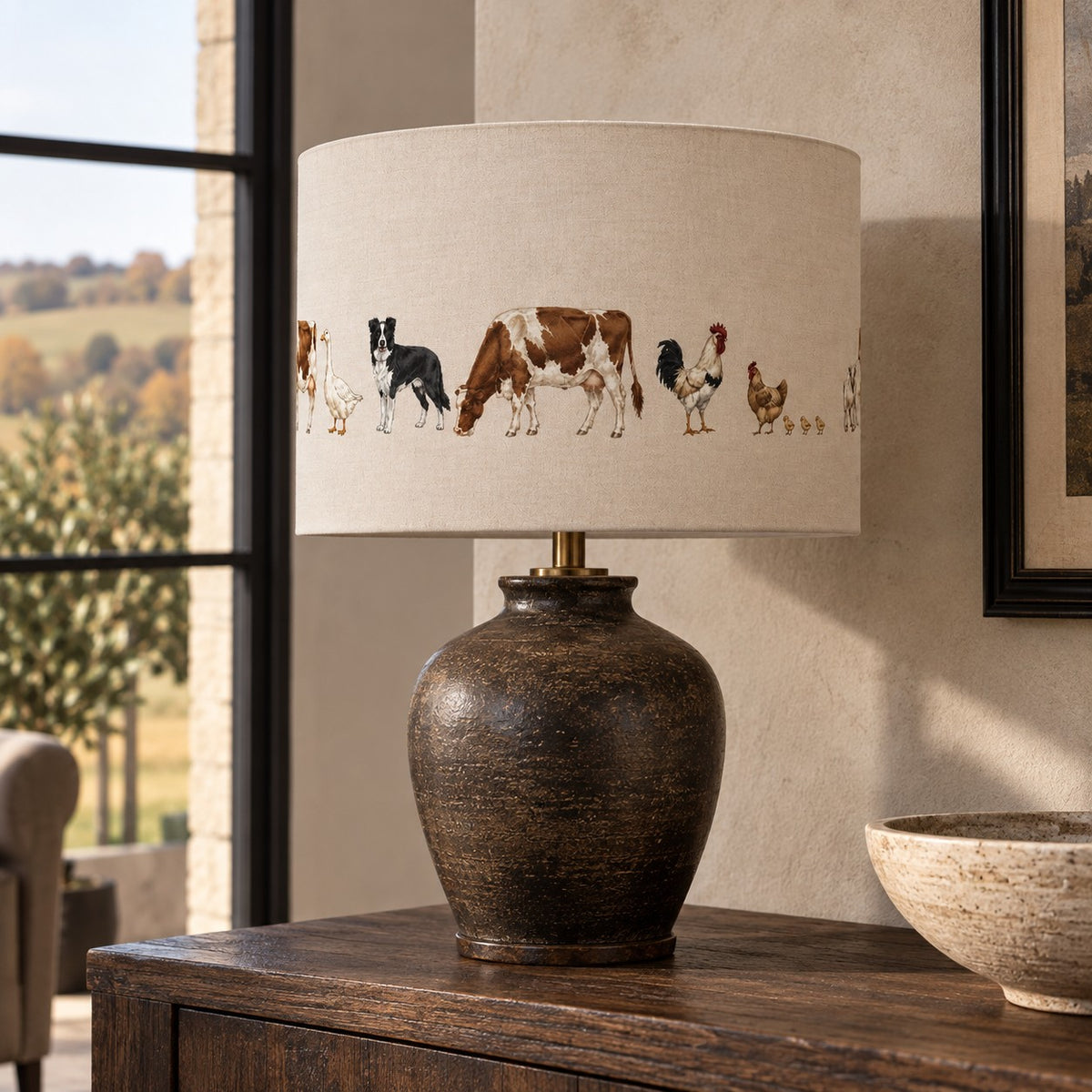 The Farmyard Lampshade from the Aminelle & Willow Country Edit featuring Border Collie, cow, goose, cockerel and chickens on linen-look fabric