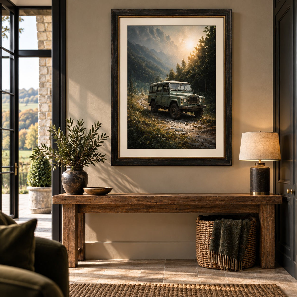 The Long Way Home framed wall art featuring a classic green 4x4 on a mountain track surrounded by woodland